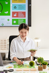 People in Modern corporate work on renewable energy to representing ESG Enviromental, Social,...