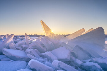 View of crystalline ice shards catching the light of the sun in a winter landscape, Baikal, Irkutsk Oblast, Russia.