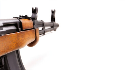 Detailed side profile of rifle showcasing its wooden stock and metal components against clean white background, emphasizing its craftsmanship and design. image evokes sense of precision