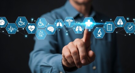 A person touching a digital interface with medical icons displayed on a dark background in a studio shot