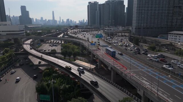 Public And Private Vehicles Driving In Sirat Expressway In Bangkok, Thailand. - aerial shot