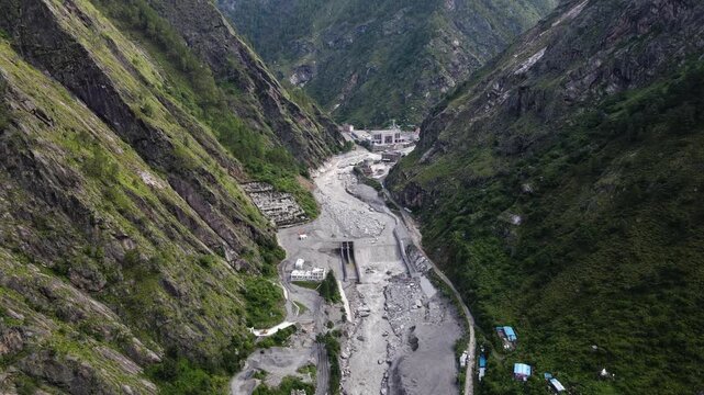 The aerial view shows the Rasuwagadhi flood destroying a Friendship bridge, road, a hydropower substation, and sweeping away vehicles in Rasuwa, Nepal