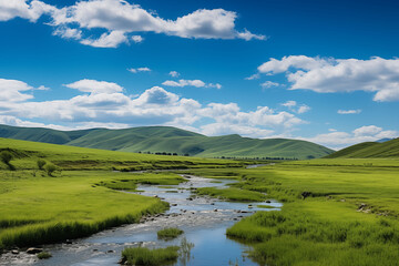 A quiet winding stream in Bayan Bulux, a lush green grassland