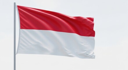 Obraz premium A clean 3D render of the Indonesian national flag waving on a pole, with a bright, overcast sky background.