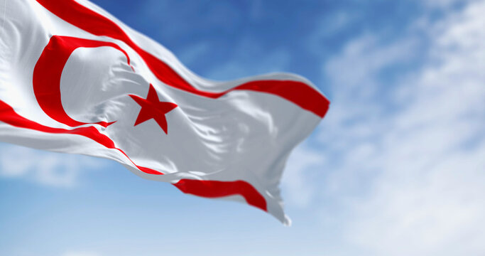 National flag of Northern Cyprus waving in the wind on a clear day