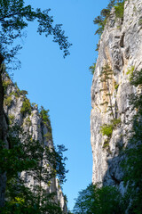 Natural Canyon Landscape with Rocky Cliffs and Blue Sky