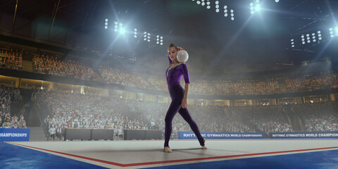 Rhythmic gymnastic girl on professional 3-d gymnastic stadium.