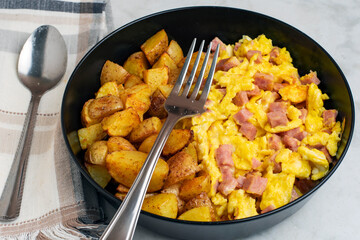 scramble eggs  with diced spam  and home fries