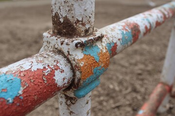 Rustic metal fence section, chipped paint