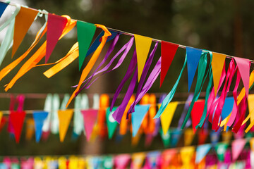 Colorful triangle flags and ribbons for outdoor celebration