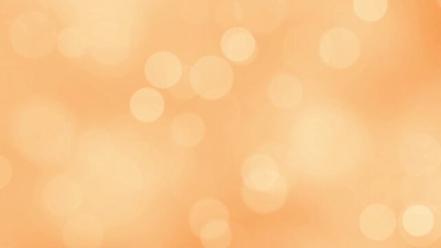 オレンジ　玉ボケ　ループ動画　抽象的　光る　キラキラ　ファンタジー　紅葉　Abstract background with orange bokeh lights.Loop video.