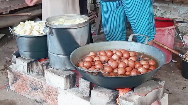 In some rural communities in Indonesia, cooking using a wood-burning stove is still common practice because it gives the food a distinctive aroma and taste.