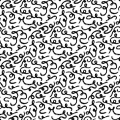pattern of swirling lines made with a dry brush. A seamless texture of brush strokes. Black paint draws wavy lines and dirty, curved strokes. Grunge-style brush lines. Calligraphic strokes and stamps