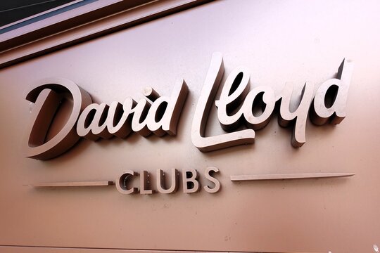The logo of David Lloyd Clubs is displayed outside their health and fitness centre located in Cricklewood, North London