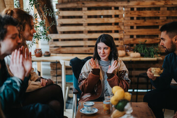 A cheerful group of friends having a discussion in a warm and vibrant rustic cafe. The setting is cozy, with plants and wooden decor creating a relaxing and welcoming atmosphere.