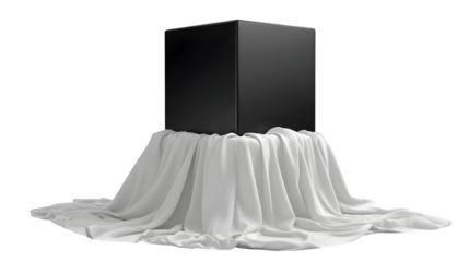 Black Cube Hovering Over White Draped Fabric