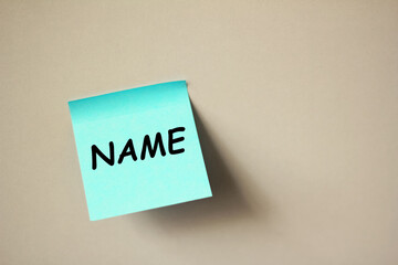 NAME word written on on a blue sticker for your desing, concept.