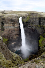 haifoss waterfall in the highlands of Iceland plummeting into a deep canyon of the Fossardalur valley