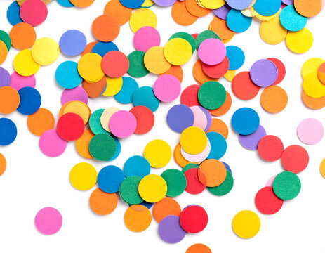 An energetic explosion of diverse colorful confetti circles spreads joy on a pristine white backdrop.