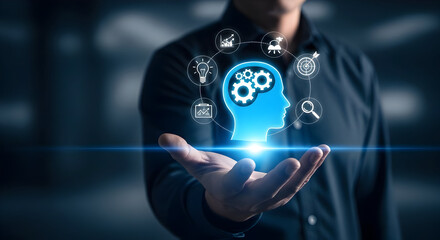 Man presenting business strategy mind map with gears, lightbulb, and charts for success