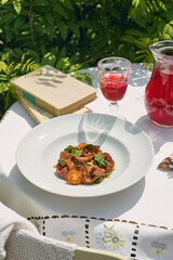 Roast beef salad with cherry tomatoes, bright natural lighting, outdoor overhead composition
