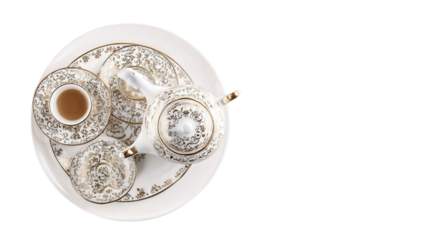 Elegant Tea Set on White Plate: A flat lay of an elegant tea set with teapot, cups, and saucers, isolated on a Transparent background, PNG file.