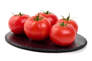 Red Tomatoes on Slate Plate, isolated on white background