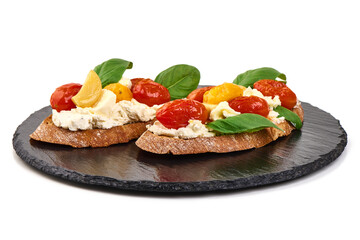 Bruschetta Bread with Tomatoes, Garlic, Basil and cream Cheese, isolated on white background.