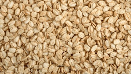 Fototapeta premium Combination of oat and rye flakes on a white background