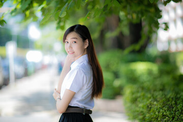 The university photography club featured a cute college student with an Asian look, capturing her...