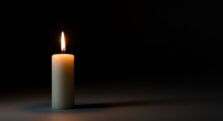 Single Illuminated Candle in Darkness Representing Hope and Serenity variation 3