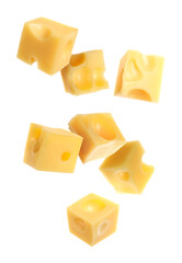 Cheese cubes in air against white background