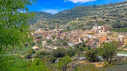 Village of Siurana with stone houses and mountains