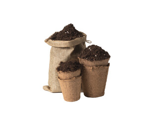Jute bag and peat pots filled with soil mixed with fertilizers on white background. Isolated
