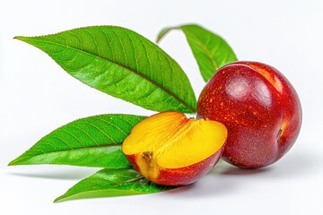 Ripe Red Plum Halved with Green Leaves on White Background