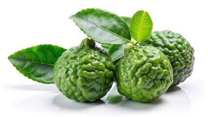 Obraz premium Fresh bergamot fruit with leaves on a white background