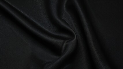 Fototapeta premium Dark fabric texture in satin finish with luxurious shine, displaying gentle wave patterns in a blurred silk cloth panorama.