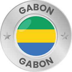 Fototapeta premium Gabon flag in silver colored medal. National flag in metal circle emblem.