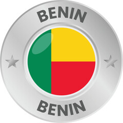 Benin flag in silver colored medal. National flag in metal circle emblem.