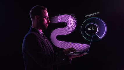 Business man with laptop tracking bitcoin mining progress in purple holographic UI. Concept of blockchain interface, crypto apps, mining dashboards, fintech data systems.
