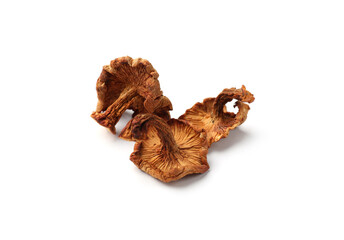 Many dried chanterelle mushrooms isolated on white