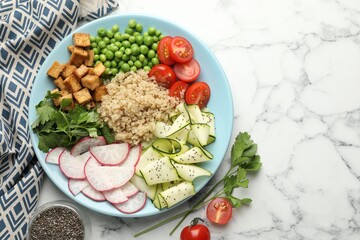 Different healthy vegetarian food served on white marble table, flat lay. Space for text