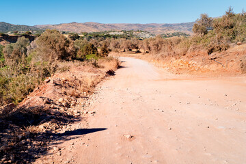 Empty gravel road on the Akamas Peninsula leads to the famous Lara Beach in Paphos, Cyprus.