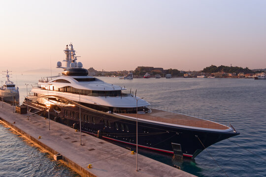 CORFU, IONIAN ISLANDS, GREECE - JULY 16, 2025: Yacht Launchpad next to companion support vessel Wingman in Corfu harbor at dawn. Luxury motor mega yacht, superyacht owned by Mark Zuckerberg. 