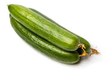 Photo of a small bunch of green natural organic cucumbers isolated on white background