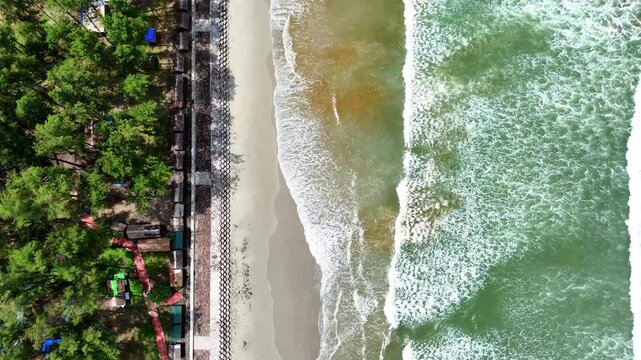 Aerial view drone shot of beautiful tropical Pasir Putih Beach, Bengkulu