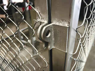 Close to the key chain connection at the steel grating door structure
