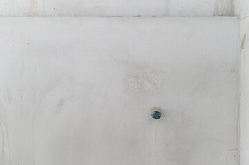 Old concrete wall surface shows its abstract texture during house renovation project. unfinished...