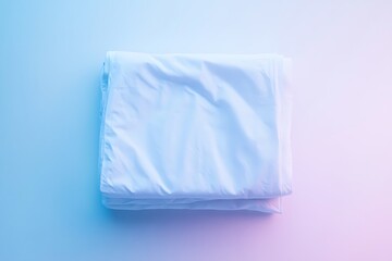 Folded white fabric with soft blue and pink light for product photography and design asset