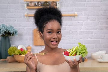 Beauty skincare routine empowers African teenage girl with healthy skin glow through daily...